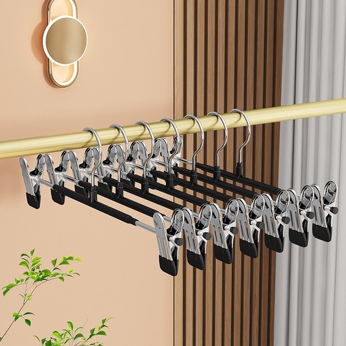Pack trouser hangers with - trouser,